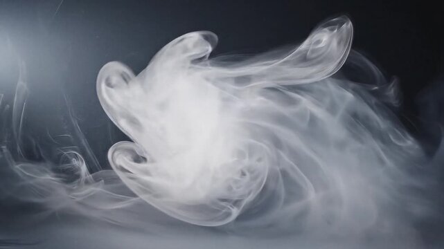 High-quality ethereal smoke background in slow motion. Perfect abstract, dynamic backdrop or overlay for titles, logos, product reveals, and cinematic scenes with a mysterious, dark mood.