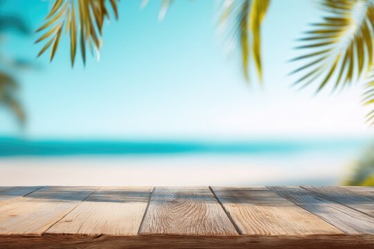 Wooden table with palm leaves and blurred turquoise beach background, ideal for summer travel designs, tropical vacation advertising, and product mockups