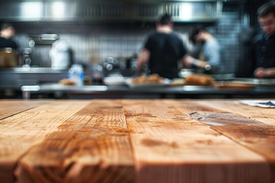Blurred kitchen scene with chefs preparing food