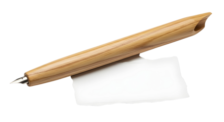Natural Wooden Calligraphy Dip Pen and Nib resting on Blank Paper Isolated