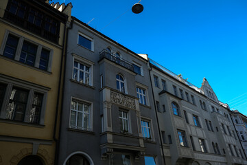 Colorful Residential Buildings in Munich under a Clear Blue Sky