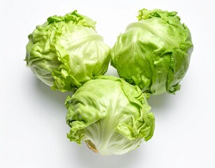 Top view of iceberg lettuces placed close together on a clean white background, showing fresh texture and crisp green color without shadows.