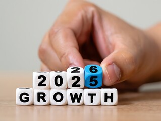 Growth in 2026 concept changing dice with human hand