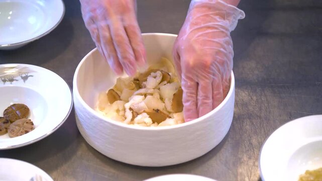 The chef is making delicious sea cucumbers and abalones