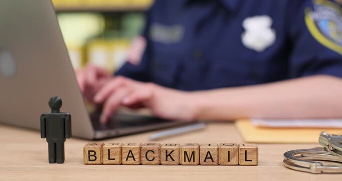 Exploring the impact of blackmail on society through a police perspective in a busy office environment