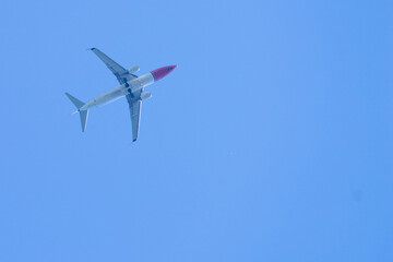 Airplane in the blue sky