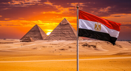 Egyptian Flag Waving Before the Pyramids at Sunset