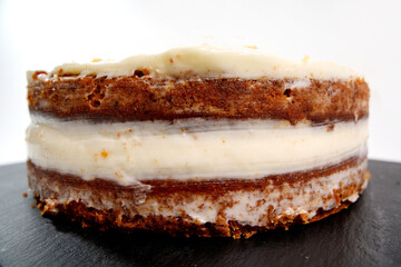 Carrot cake layers with cream cheese frosting