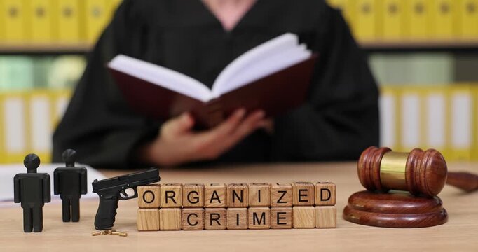 Exploring the complexities of organized crime in a courtroom setting with insightful discussions and legal perspectives