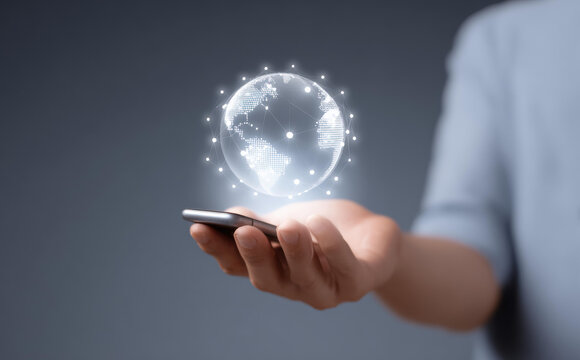 Man holding smartphone with futuristic hologram of digital global network. focused concept for connection, technology, business, ai, and worldwide innovation