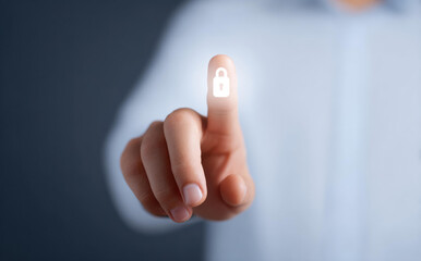 Person using fingerprint for secure access and data protection. glowing padlock symbolizes cybersecurity technology and network privacy for modern focused business