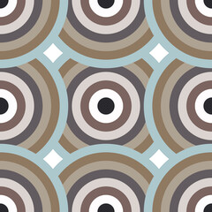 Circles in a beige and blue color palette. Seamless pattern with geometric colored spheres for textiles. 