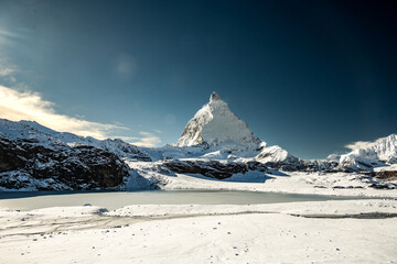 The Matterhorn With Theodulsee Frozen In The Foreground