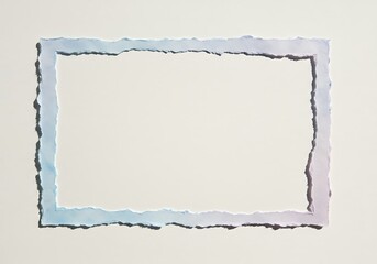 Obraz premium Minimalist handcrafted paper frame with unique torn edges and a subtle gradient creating a serene backdrop