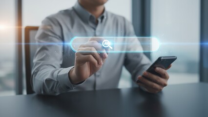 A man holding a pen near a glowing ai search bar with keywords orbiting, showing innovation and advanced process control digital tools