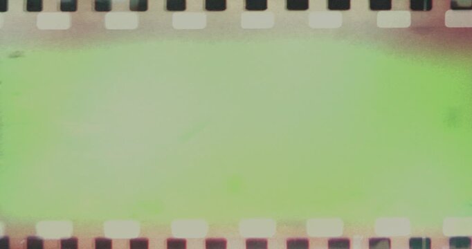 film strip transition, with chroma key green screen background, effect of old film rolling with details, scratches and grain, vintage strip intro