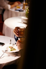 Chin chin cocktail party close-up at a restaurant in the evening