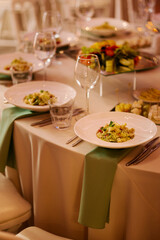 Setting the restaurant's bright tables in the sunset light