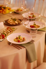 Setting the restaurant's bright tables in the sunset light