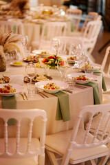 Setting the restaurant's bright tables in the sunset light