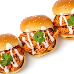 Delicious pulled chicken sliders with creamy sauce and fresh cilantro