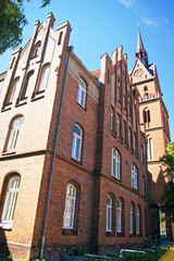 Fototapeta premium View of the Sacred Heart Church in Lübeck, Germany. Symbolizing faith, spiritual heritage, religious tourism, and the timeless beauty of sacred architecture within the historic Hanseatic cityscape.