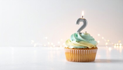 Festive Cupcake with a '2' Candle Celebrating a Second Anniversary or Birthday Milestone