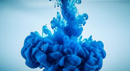 Blue ink swirling in water with dynamic movement and soft backdrop  