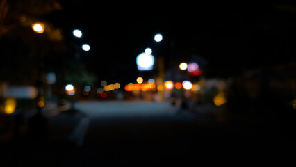 Blurred tranquil dreamy city road at night