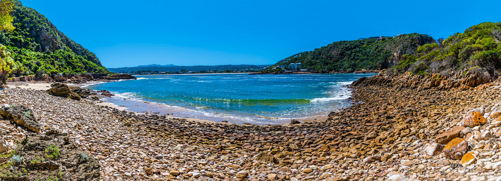 A panorama view across a rocky shoreline on the West Head headland, South Africa in Springtime