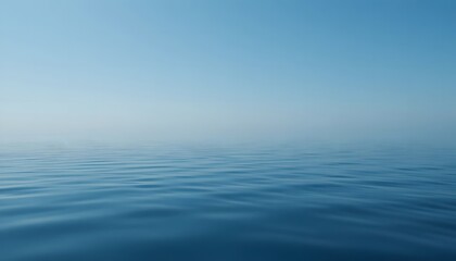 Naklejka premium Clear blue sky reflected in calm water surface.