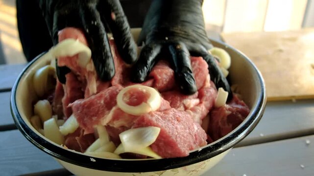 A man cutting meat. Selective focus.