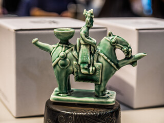 Seoul, Korea &ndash; September 23, 2025: Ceramic Horse Rider Figurine Music Box Inspired by Gaya Pottery at National Museum Shop