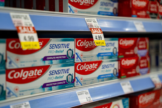 Close up of Colgate Sensitive Pro-Relief toothpaste boxes on store shelf. Toronto, Canada - September 18, 2025.