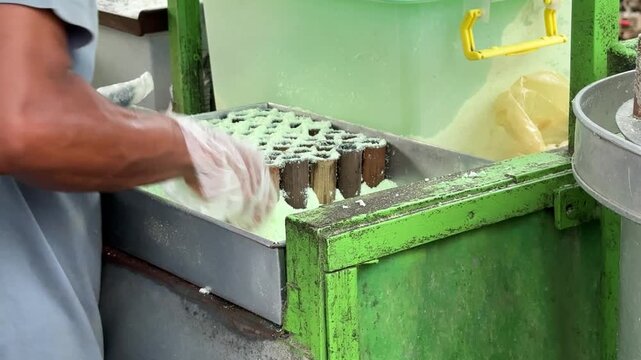 indonesian traditional cake called Kue Putu or Putu bambu. Steamed rice cake with palm sugar