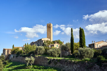 Stone houses, medieval tower on top of a hill in Pereta, Tuscany
