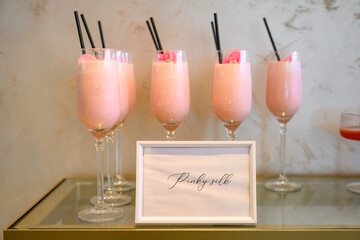 Original Pinky silk cocktail with a straw