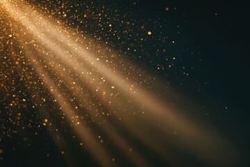 Golden glitter particles falling through light rays