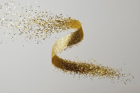Golden glitter swirling ribbon creating festive abstract celebration