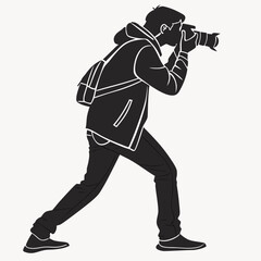 Silhouette of man photographer taking photo with camera