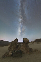 Stunning night sky over Mount Teide in Tenerife, Canary Islands. The Milky Way arches across the sky above the volcanic landscape of Teide National Park. A breathtaking astrophotography scene perfect 