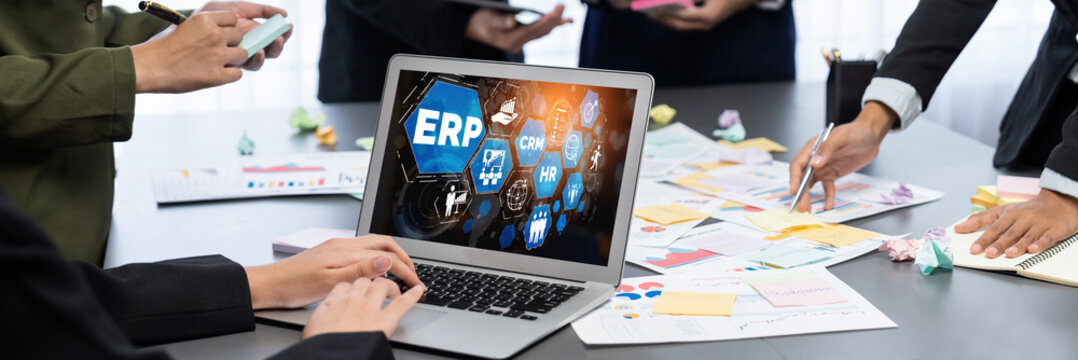 Analyst team use sticky note for creative and analytic brainstorm for business idea with BI data dashboard on laptop screen. Analysis financial data visualization tech for marketing strategy. Prodigy - Powered by Adobe
