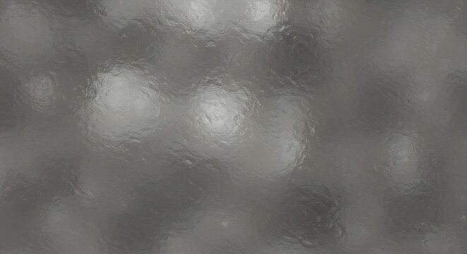Gray mottled surface with blurred reflections suggests a textured or distorted material