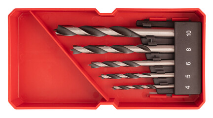 A set of high-quality drill bits neatly placed in a bright red case, showcasing different sizes ideal for woodworking and construction projects. Perfect for every toolbox
