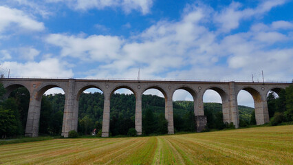 Fototapeta premium Aerial droe view of the huge stone Kleiner Viaduct, North Rhine Westphalia, Germany, July 15, 2024