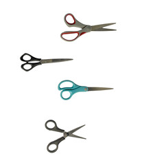 Scissors in array of colors, open and closed, create abstract shapes on a white plain