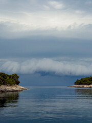 Islands and Calm Waters Under a Dramatic Cloudy Sky