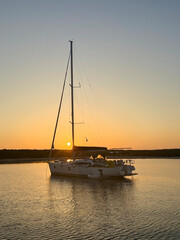 Sailboat Anchored at Golden Hour