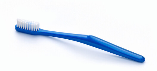 Blue plastic toothbrush for oral hygiene and dental care