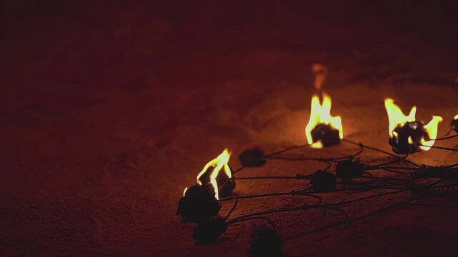 Female fakirs. Torch on the ground. Slow motion. High quality 4k footage